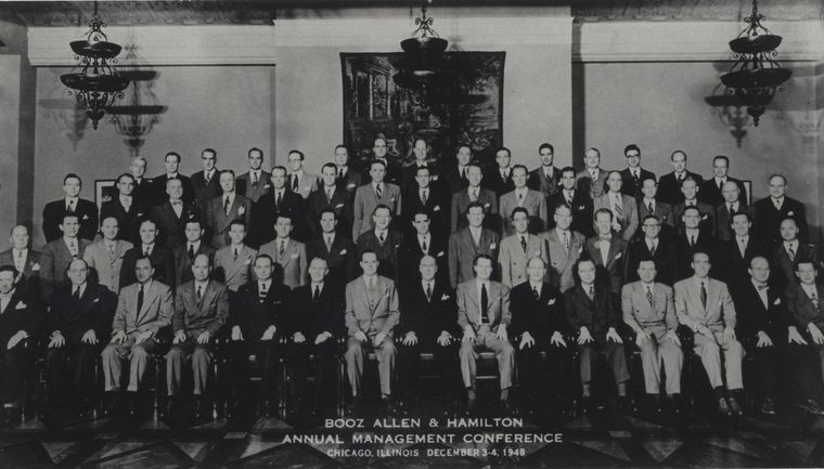 Group portrait of men in suits at the Booz Allen management conference in 1948
