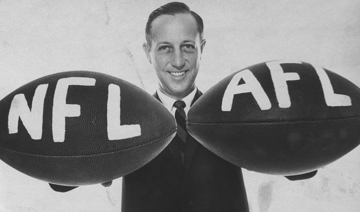 Please contact your Account Representative for licensing use on merchandise and/or resale products; fine art prints, wall décor, gallery, nonprofit or museum displays.Mandatory Credit: Photo by Bob Gomel/The LIFE Picture Collection/Shutterstock (12067188c)Natl. Football League commissioner Pete Rozelle holding together 2 footballs labelled NFL & AFLPete Rozelle, USA