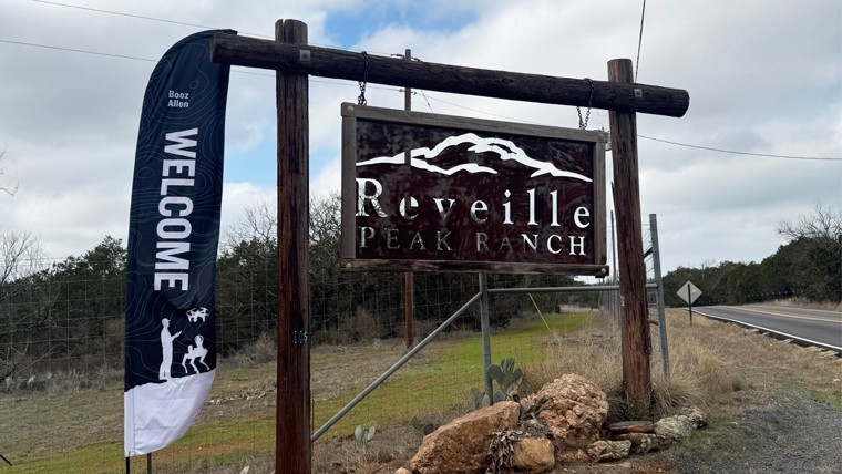Wooden Reville Peak Ranch welcome sign 