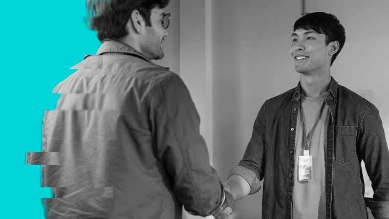 image of two coworkers shaking hands