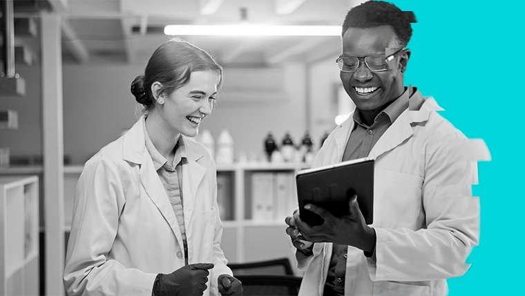 image of lab workers laughing