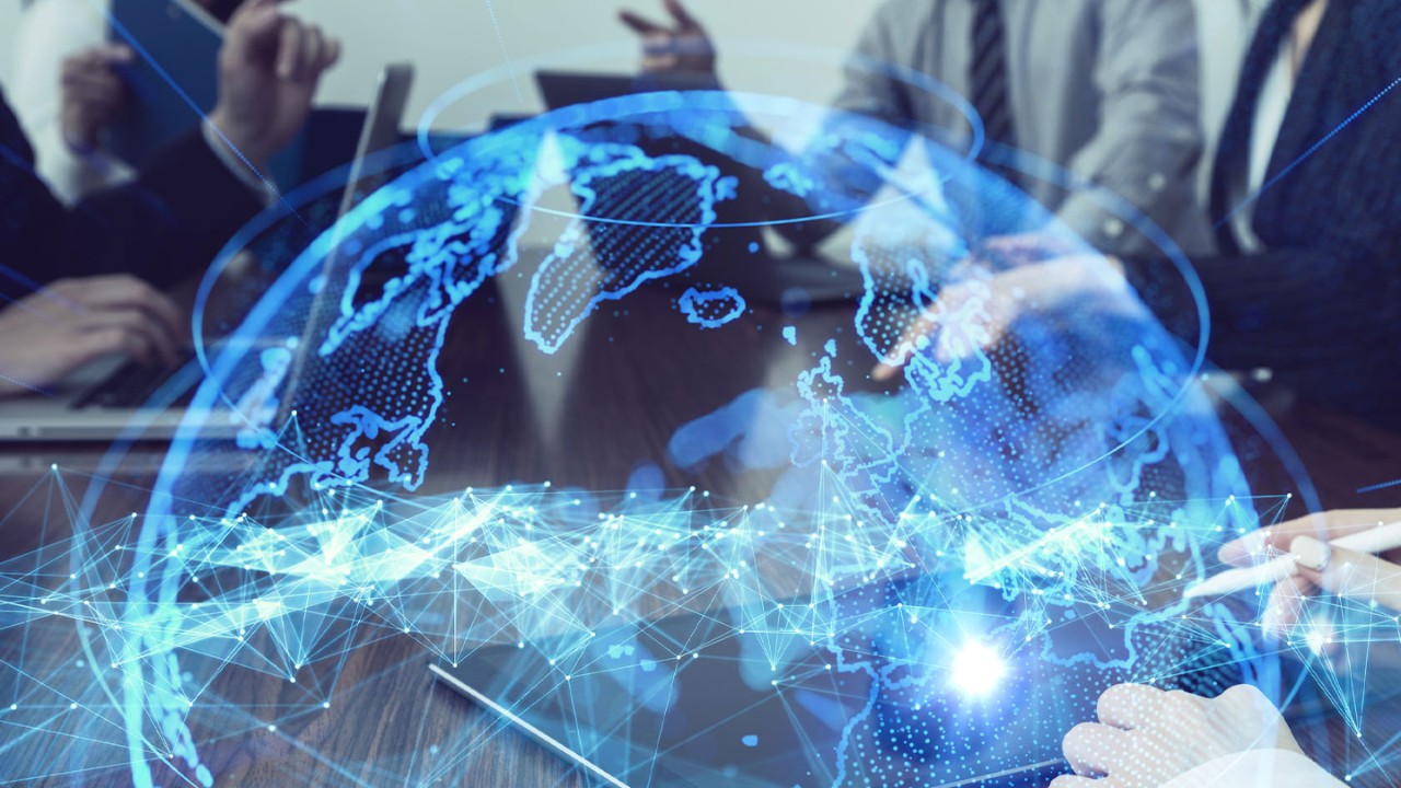 Business meeting with cloud graphic concept overlaid