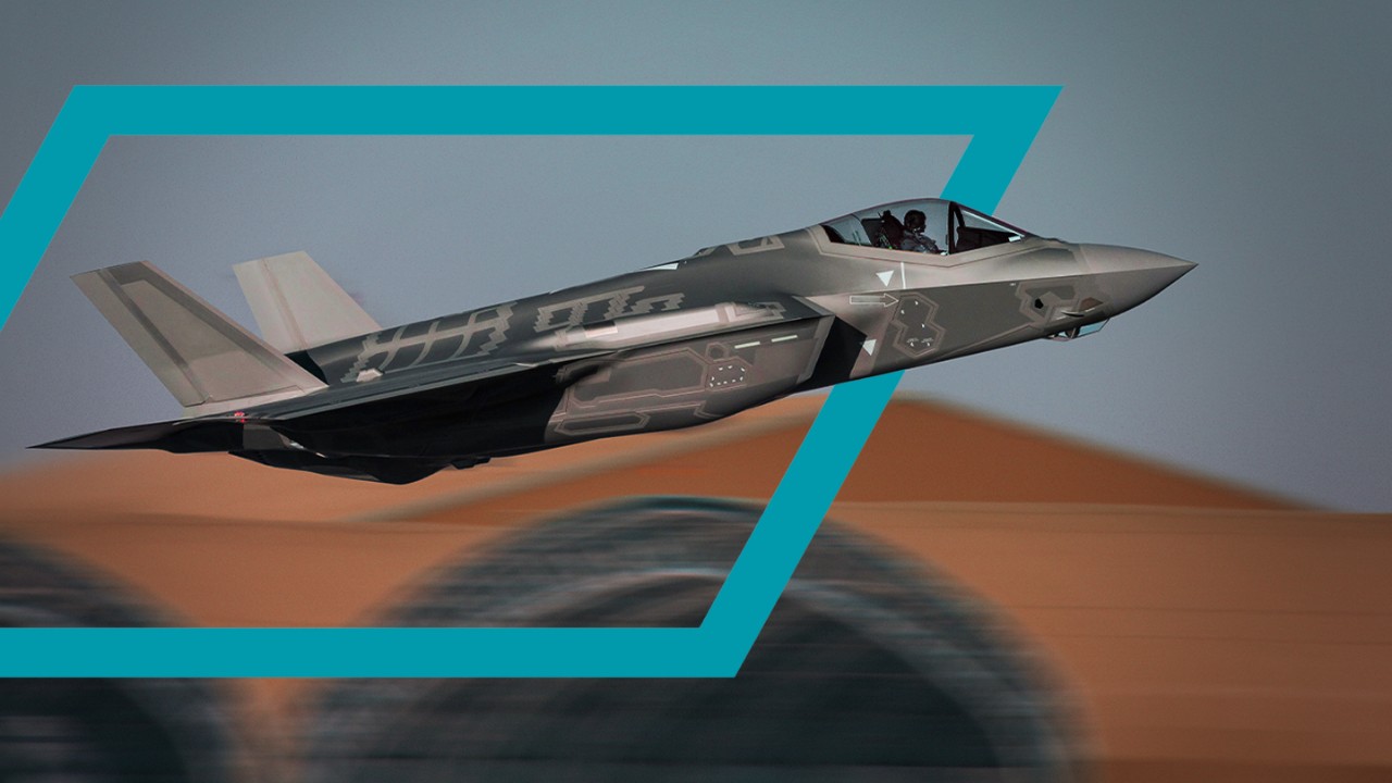 Image of a fighter jet in flight with Booz Allen's brand treatment applied