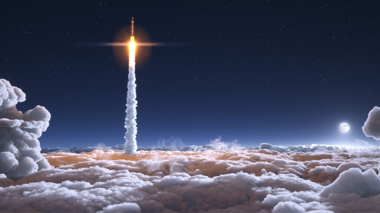 Rocket flying through the sky above the clouds
